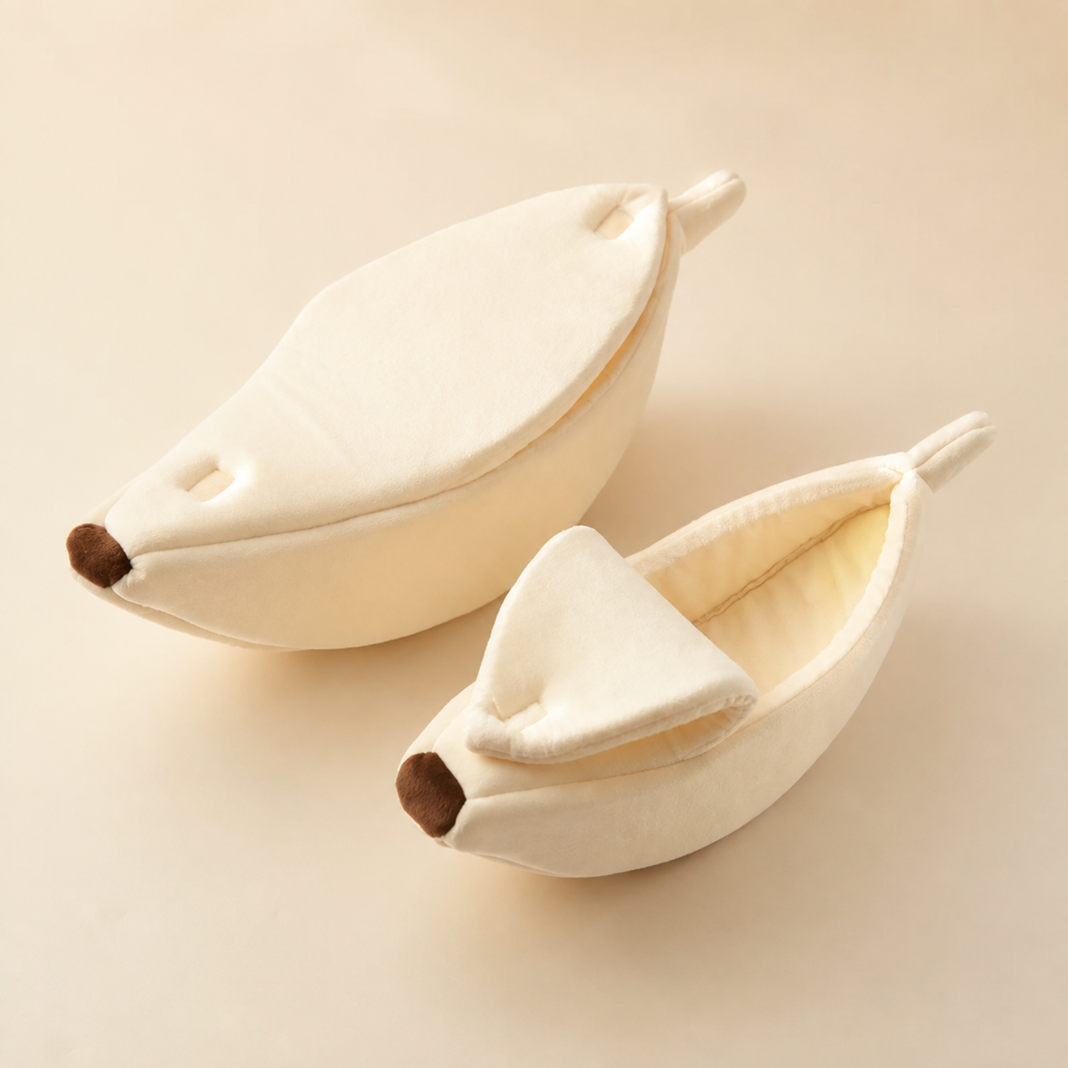 White banana-shaped pet bed