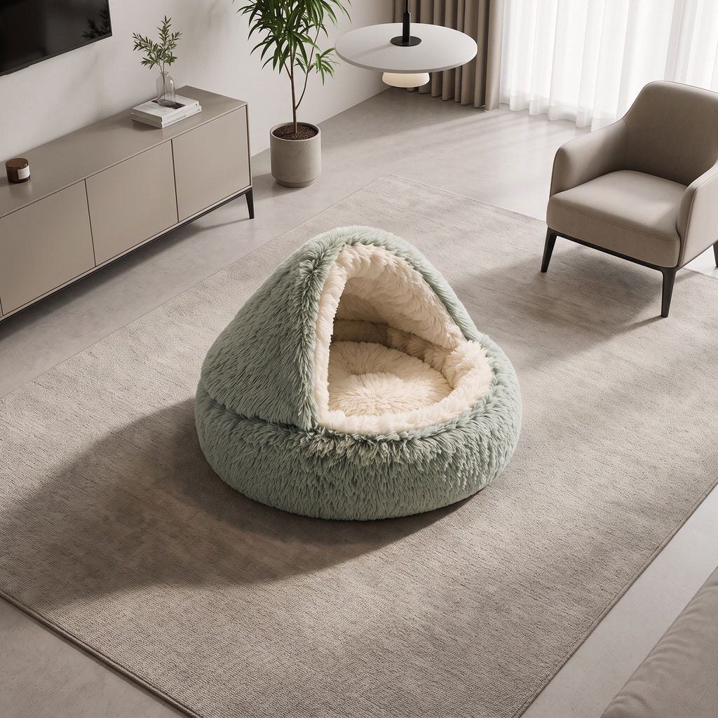 Modern semi-enclosed pet bed placed on a neutral area rug in a living room.
