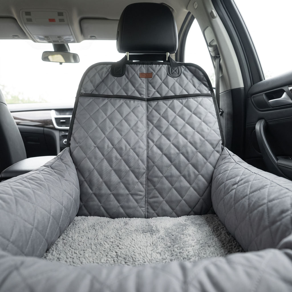 View from pet perspective inside car bed showing back-rest connection to seat headrest.